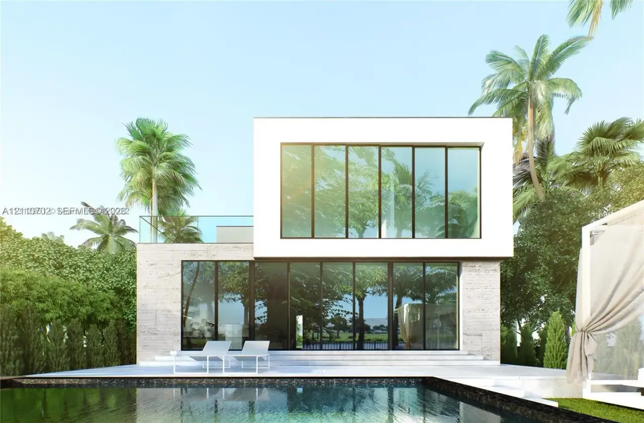 Modern architectural exterior featuring expansive floor-to-ceiling windows, natural stone facade, second-story balcony with glass railing, and a private swimming pool Modern architectural exterior featuring expansive floor-to-ceiling windows, natural stone facade, second-story balcony with glass railing, and a private swimming pool