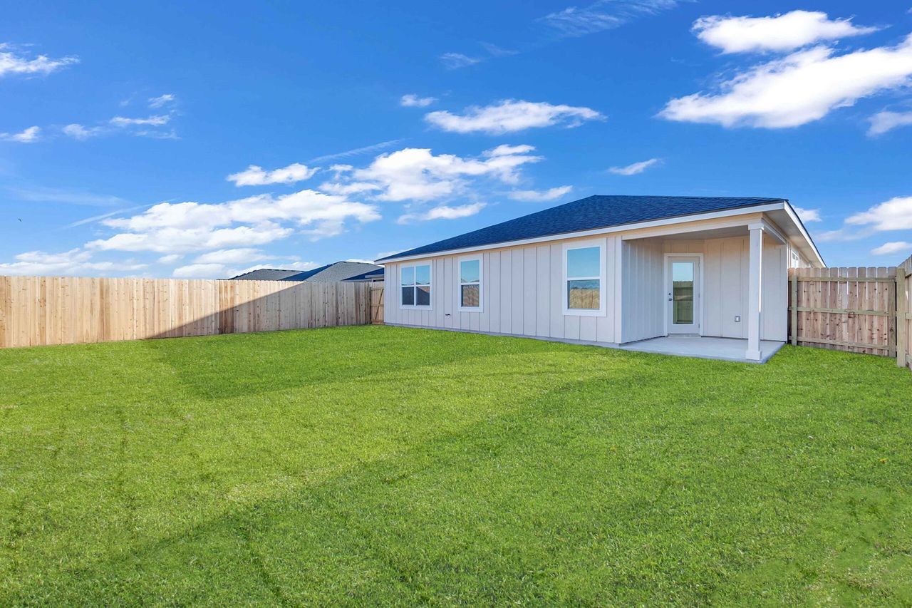 Exterior details and patio area of a home in The Preserve at Thousand Oaks Single Family, Killeen (Image 2).