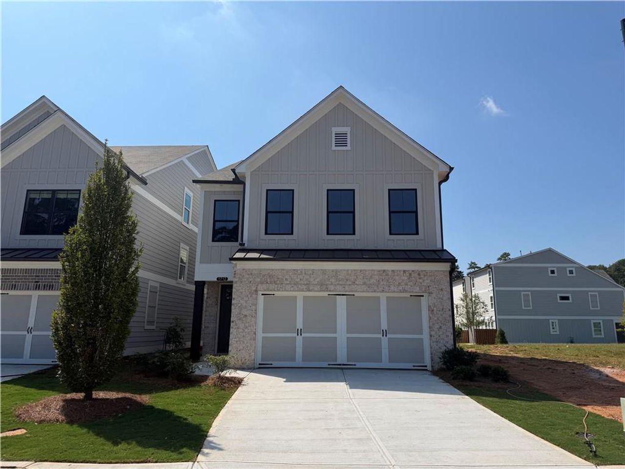 Front exterior of a new home in , Marietta, GA, highlighting curb appeal (Image 2).