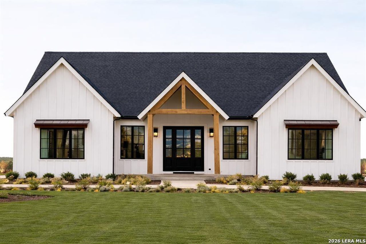 Front exterior of a new home in , La Vernia, TX, highlighting curb appeal (Image 2).