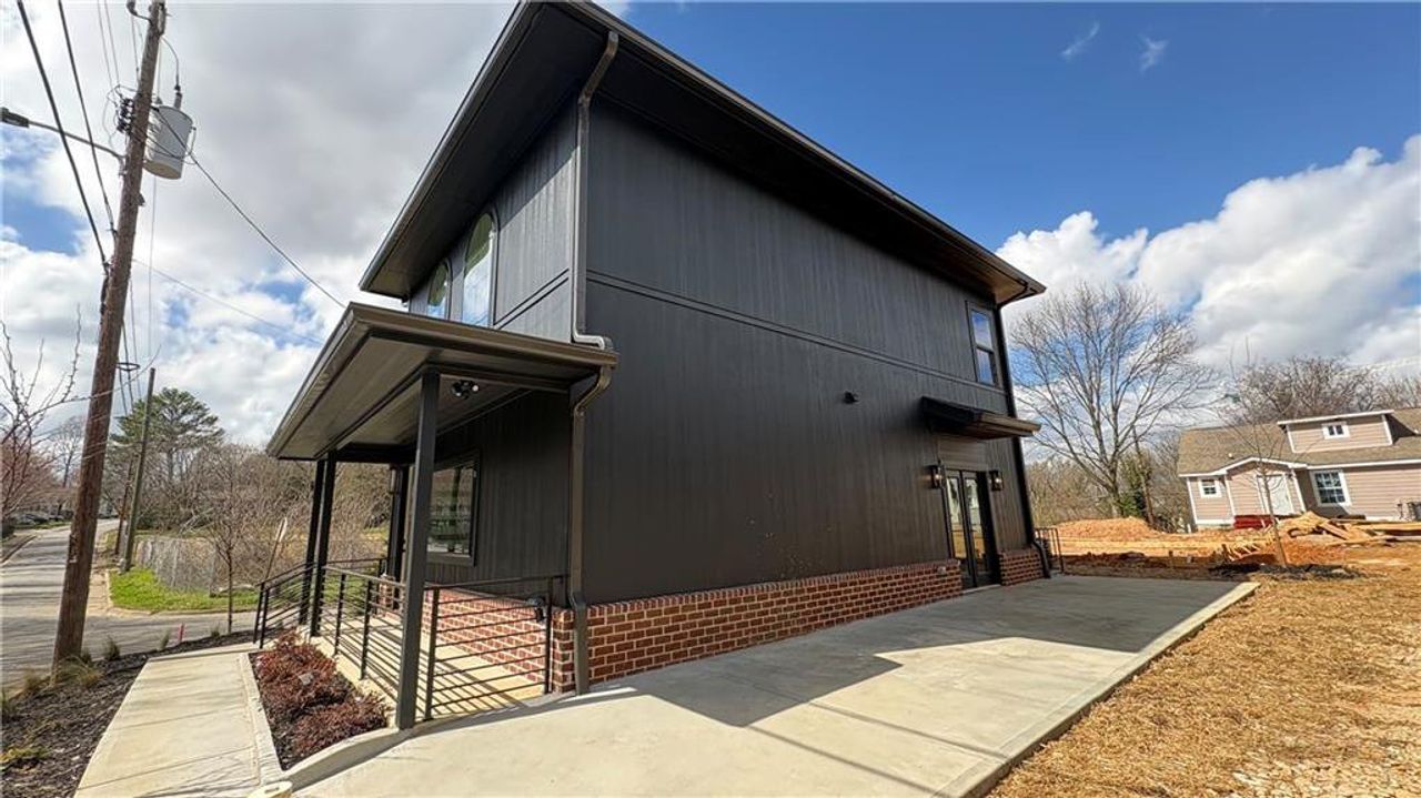 Exterior details and patio area of a home in , Atlanta (Image 2).