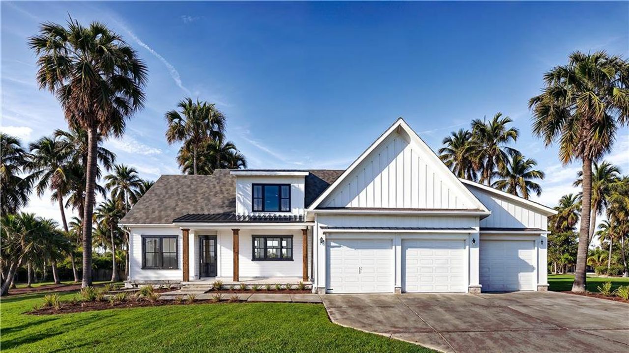 Front exterior of a new home in , Ball Ground, GA, highlighting curb appeal (Image 2).