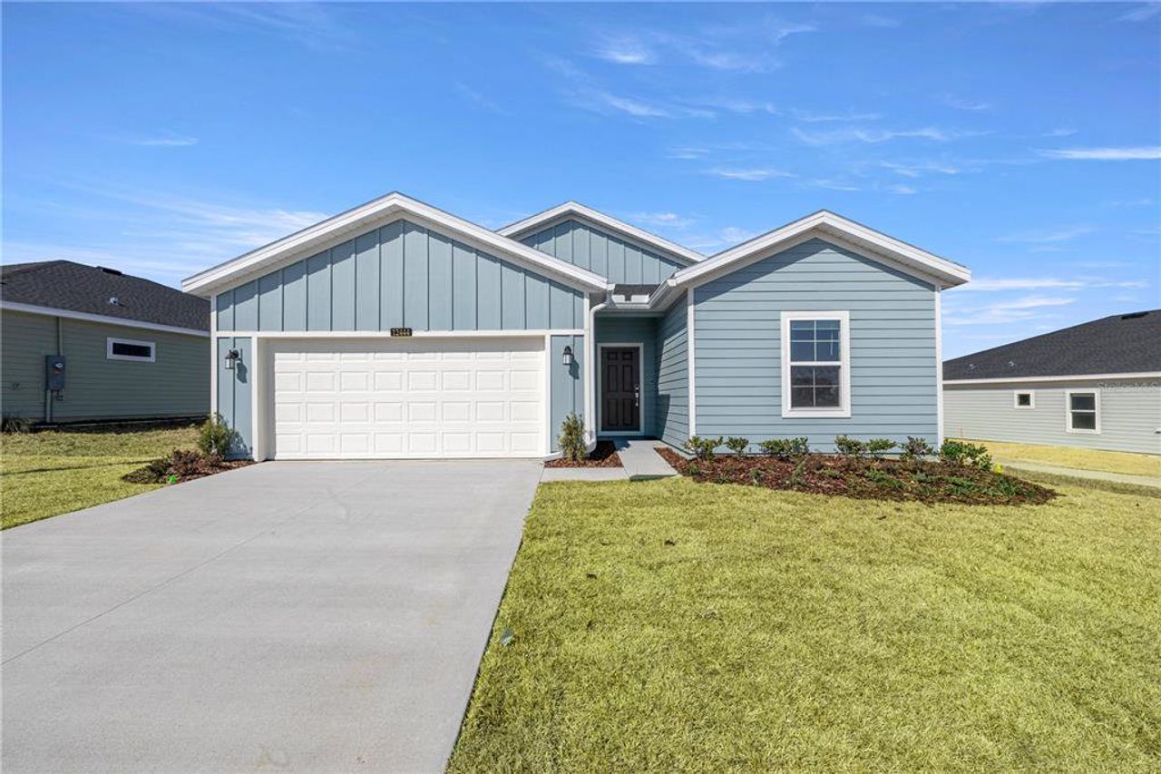 Front exterior of a new home in Millwood, Ocala, FL, highlighting curb appeal (Image 2). Front exterior of a new home in Millwood, Ocala, FL, highlighting curb appeal (Image 2).