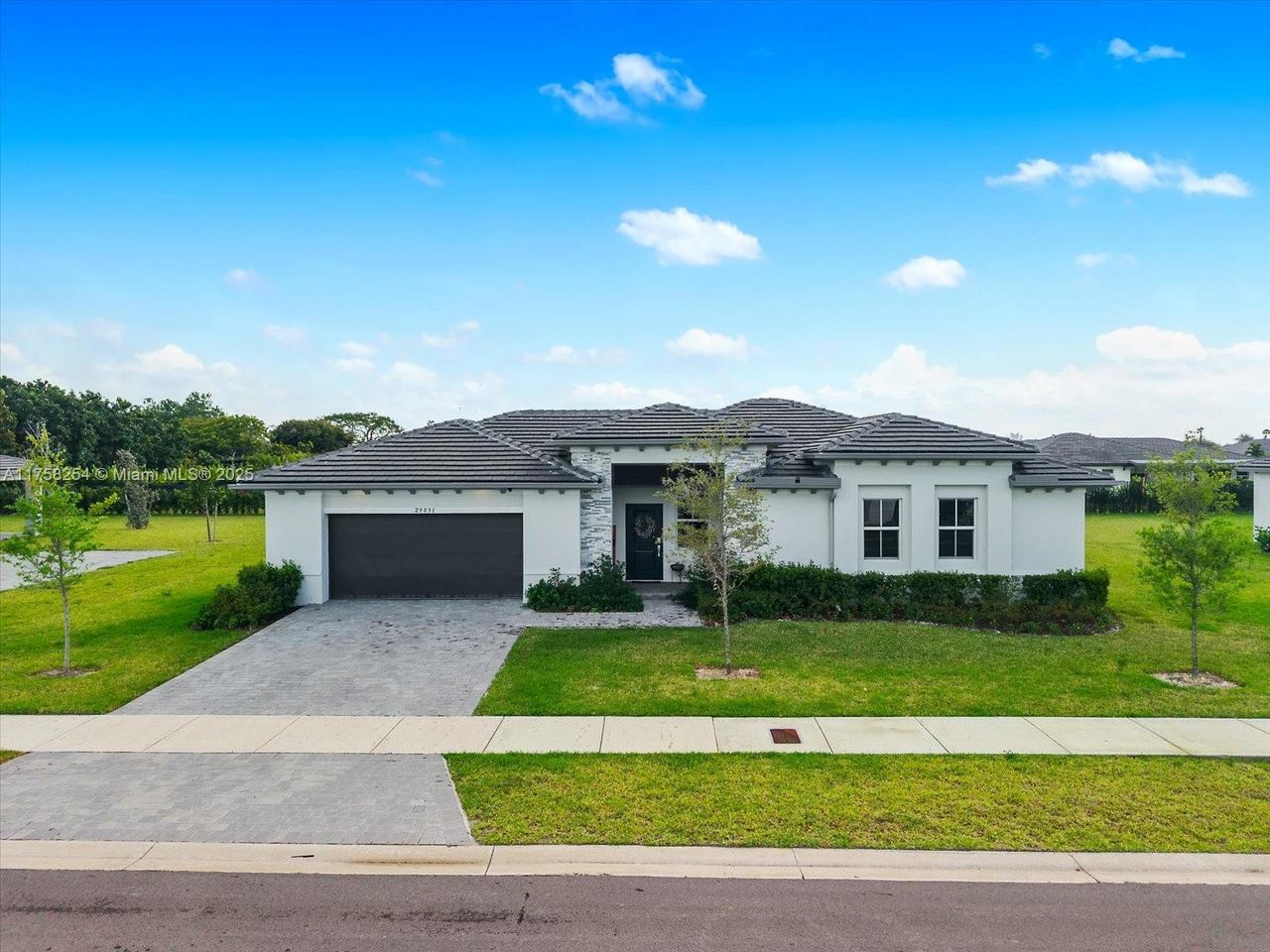 Front exterior of a new home in , Miami, FL, highlighting curb appeal (Image 2).