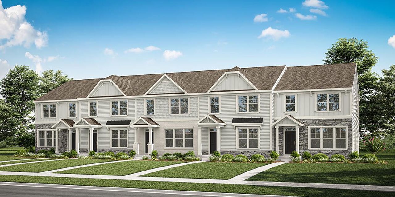 Front exterior of a new home in Bryton Crossing Townhomes, Huntersville, NC, highlighting curb appeal (Image 2).