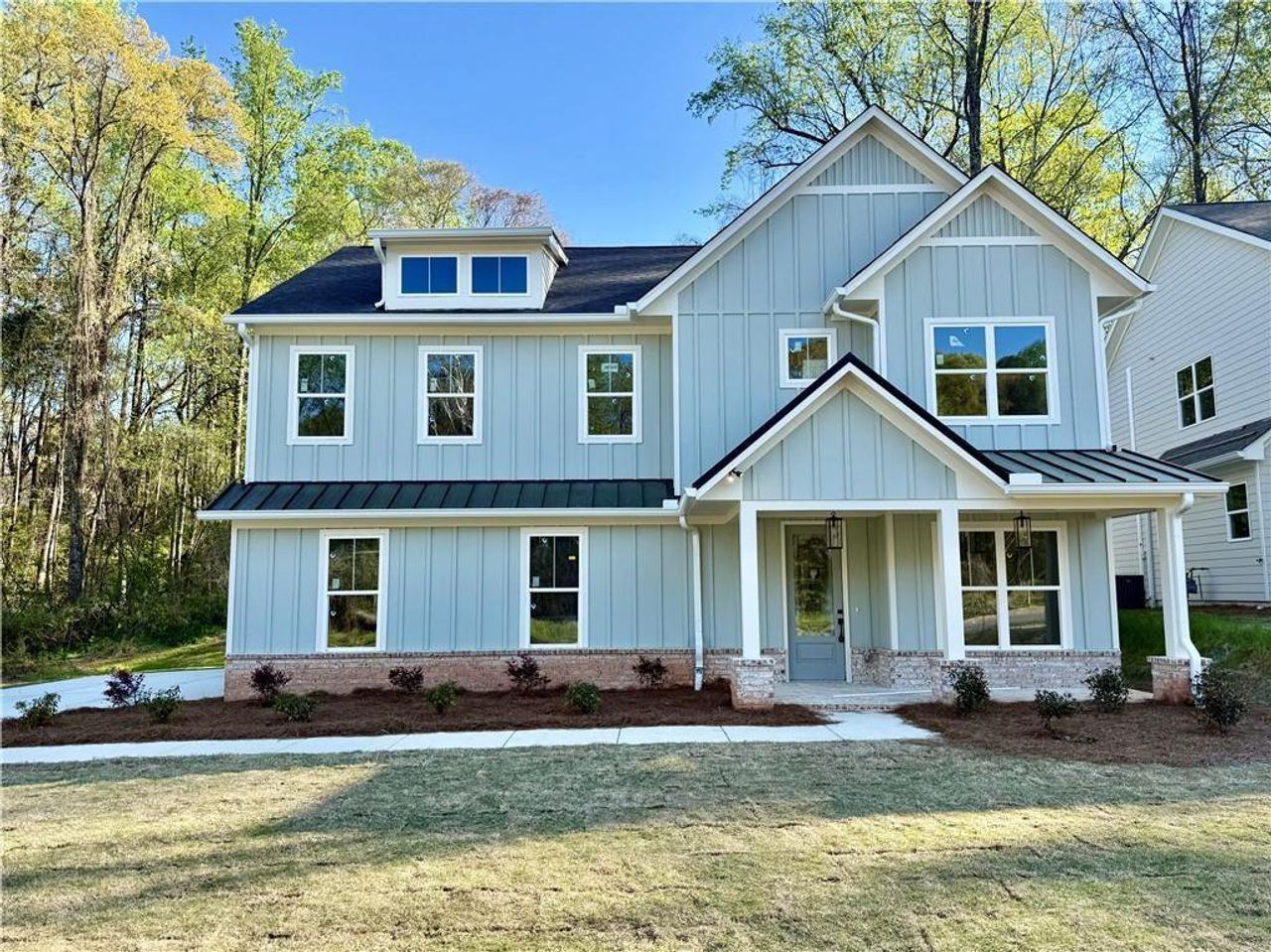 Front exterior of a new home in , Atlanta, GA, highlighting curb appeal (Image 2). Front exterior of a new home in , Atlanta, GA, highlighting curb appeal (Image 2).