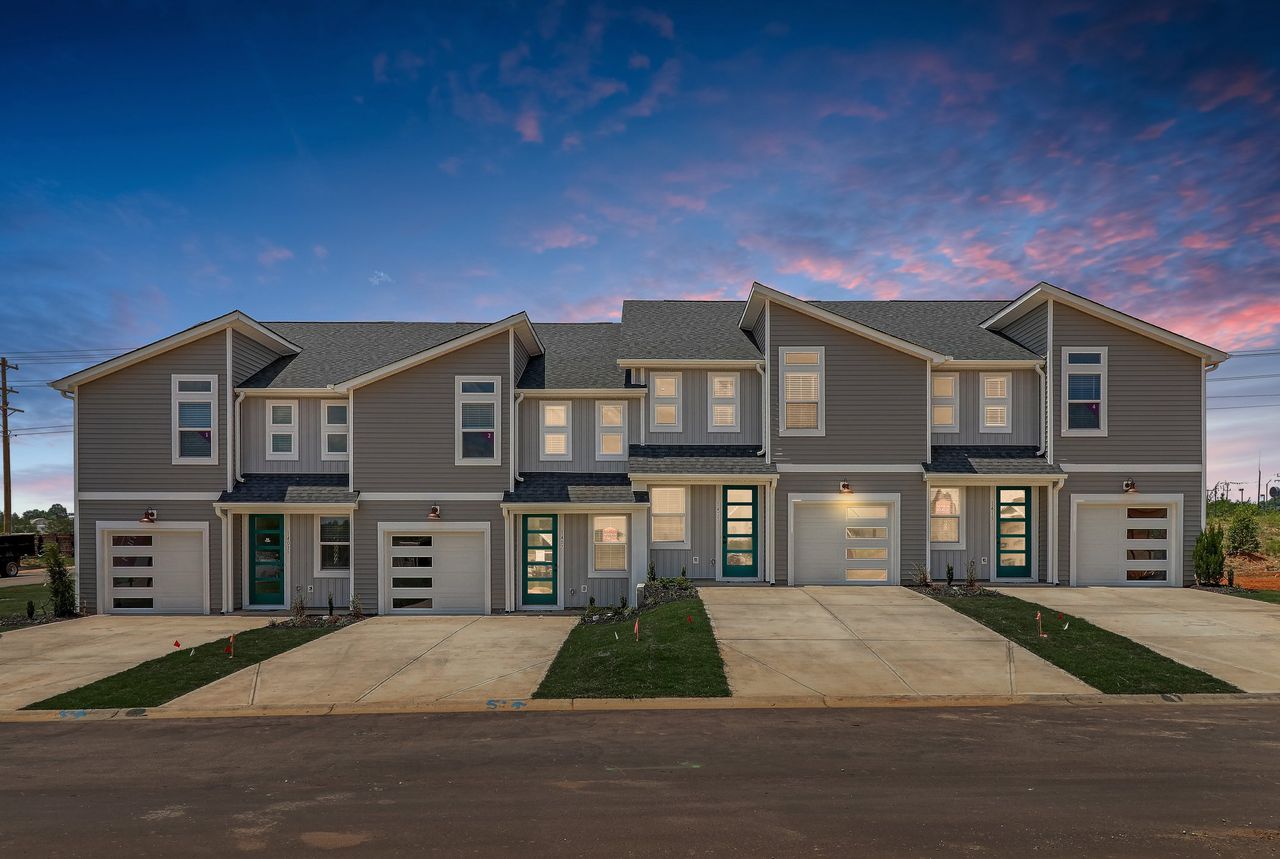 Front exterior of a new home in Westgate Village Townes, Spartanburg, SC, highlighting curb appeal (Image 2).