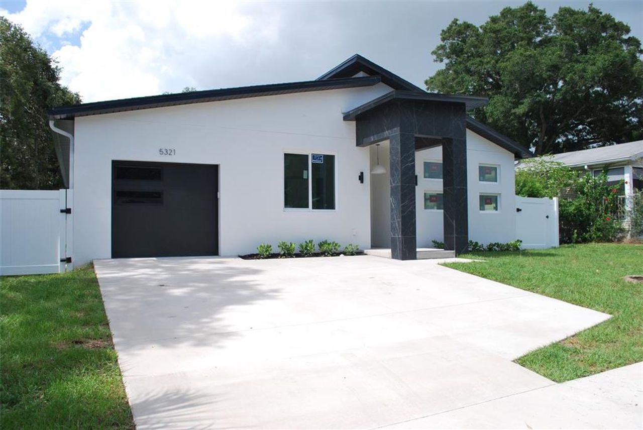 Front exterior of a new home in , Gulfport, FL, highlighting curb appeal (Image 2).