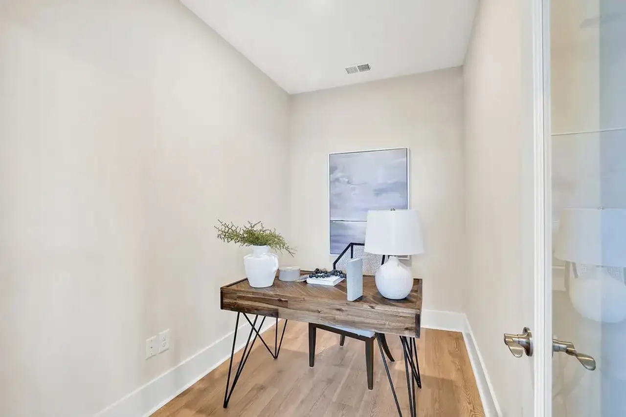 Furnished interior view inside a new home in East Lake, Leland (Image 2).