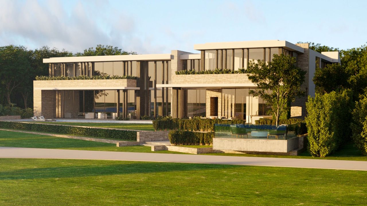 Representative exterior photo of a completed home built from the LUGANO by Centaur Holdings in Panther National, Palm Beach Gardens, FL (Image 2).