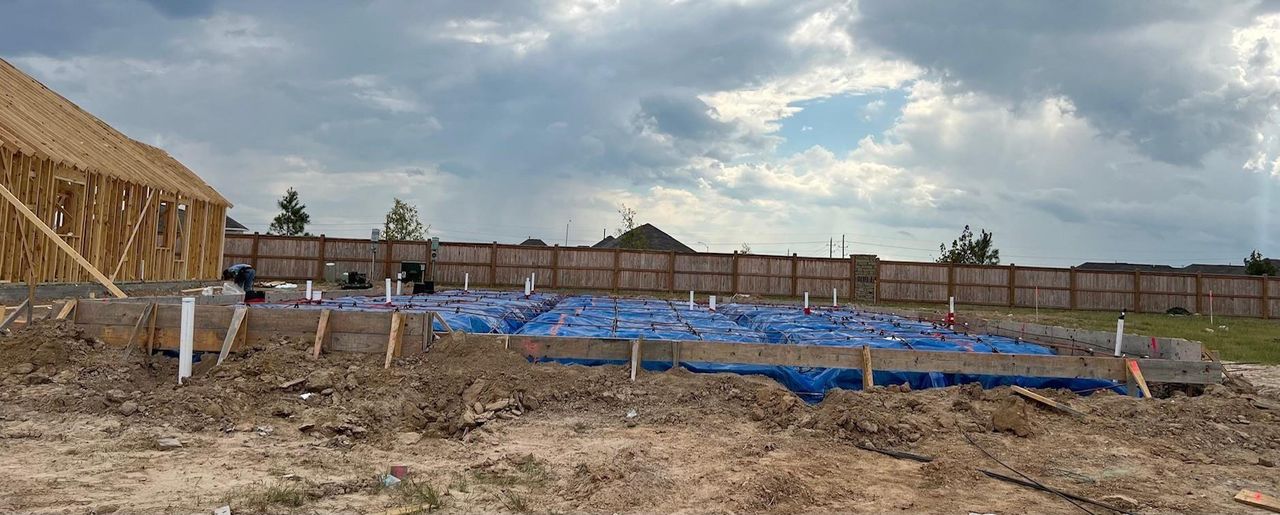 In-progress construction of a new home in Sienna, Missouri City, TX (Image 2).