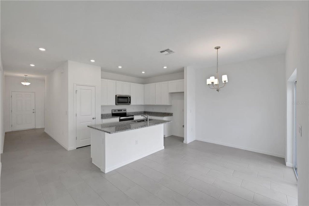 Furnished interior view inside a new home in Willowbrook North, Winter Haven (Image 2).