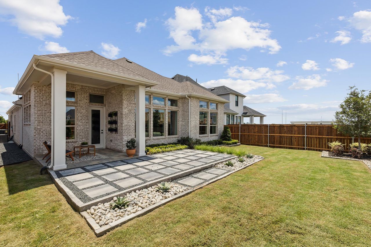 Representative exterior details of a home built from the The Pemshore by David Weekley Homes in Mantua Point Classics, Van Alstyne (Image 2).