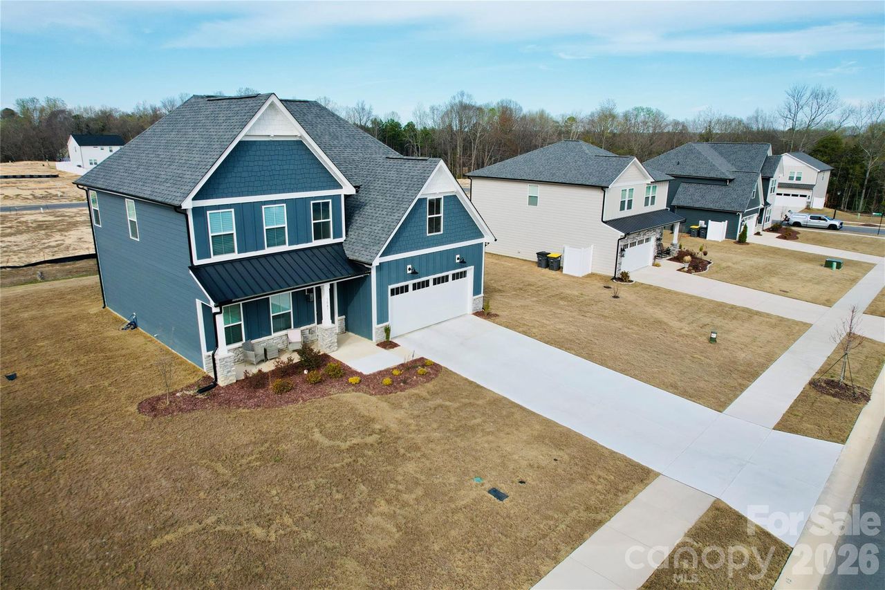 Front exterior of a new home in , Kannapolis, NC, highlighting curb appeal (Image 2).