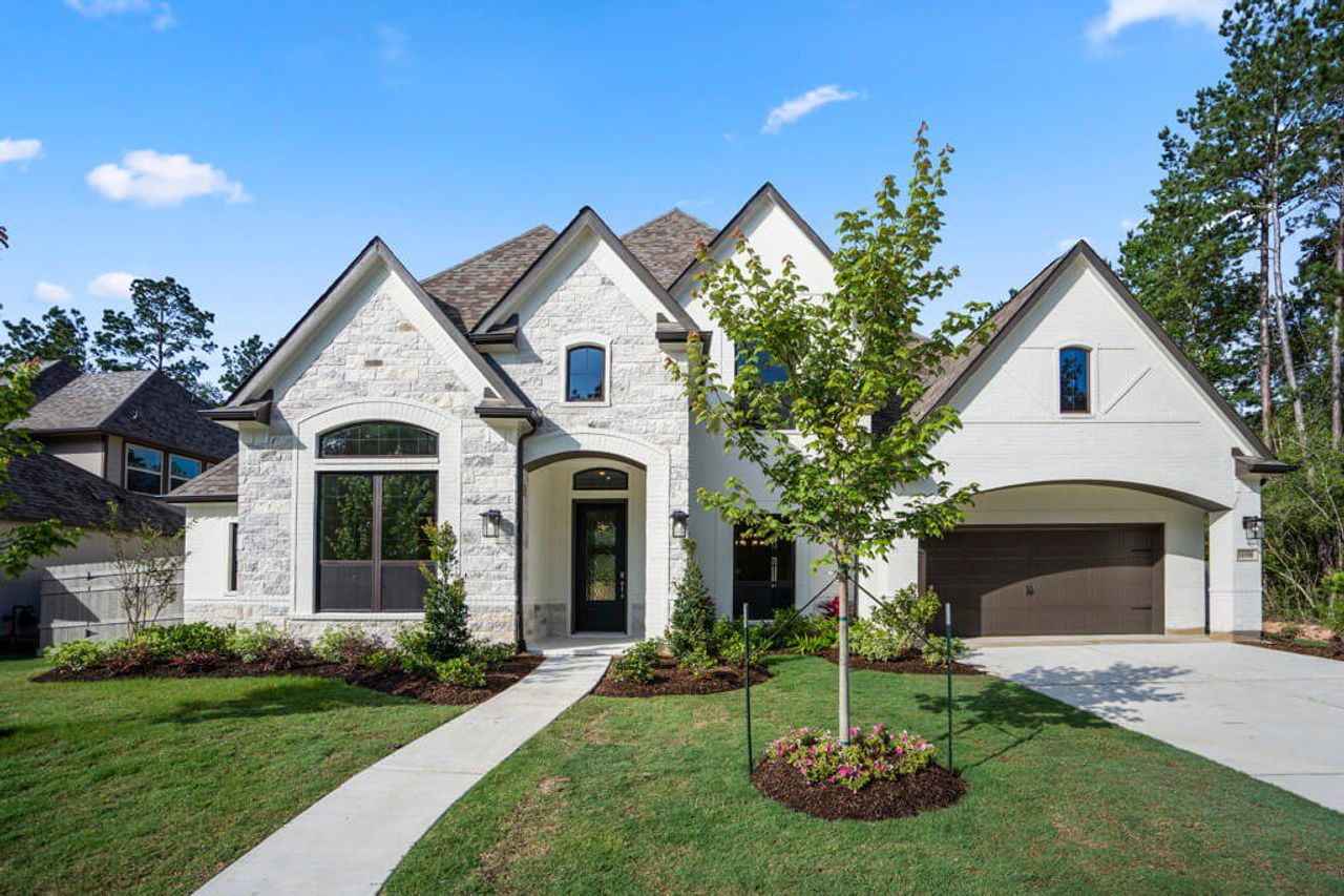 Representative exterior photo of a completed home built from the Reagan 3903 by J. Patrick Homes in Colton, Montgomery, TX (Image 2). Representative exterior photo of a completed home built from the Reagan 3903 by J. Patrick Homes in Colton, Montgomery, TX (Image 2).
