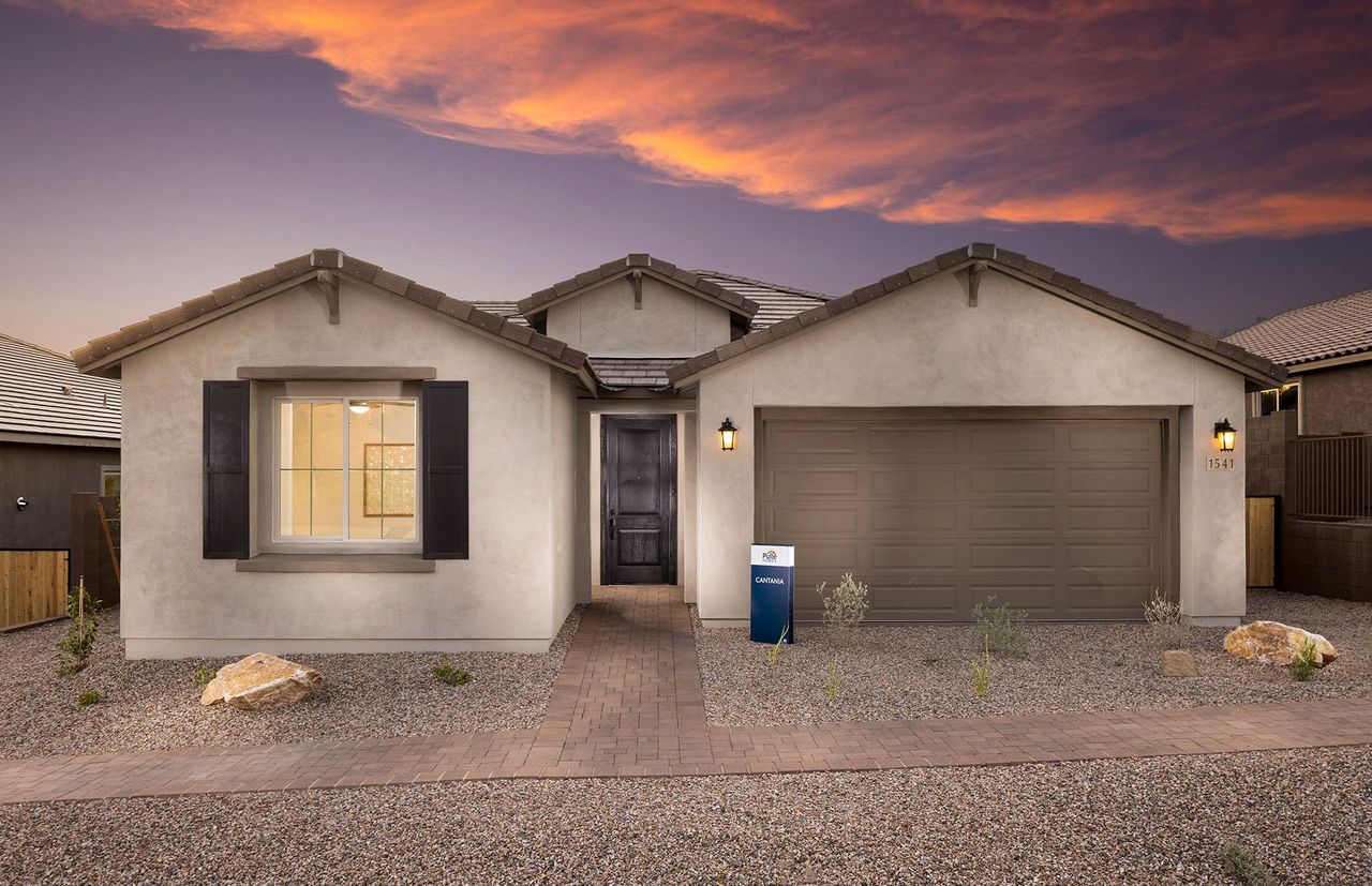 Front exterior of a new home in Vistoso Canyon Estates, Oro Valley, AZ, highlighting curb appeal (Image 2). Front exterior of a new home in Vistoso Canyon Estates, Oro Valley, AZ, highlighting curb appeal (Image 2).