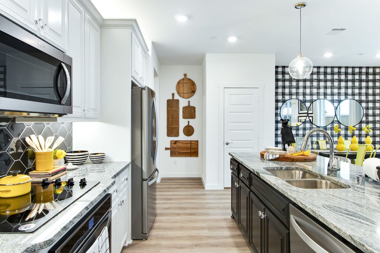 Representative furnished interior of a home built from the Olympia by Grenadier Homes in Woodbridge, Wylie (Image 2).