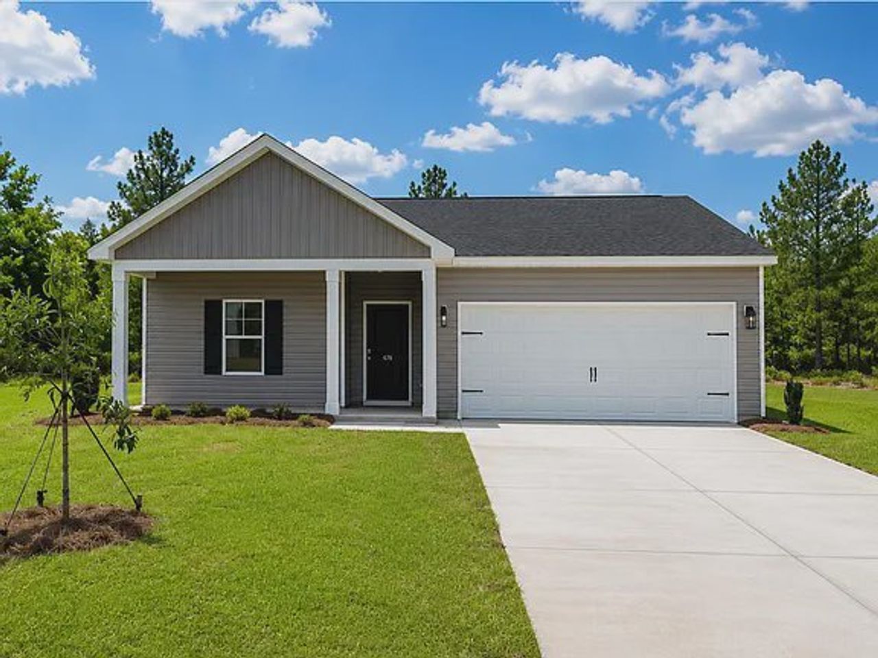 Front exterior of a new home in Amber Hill, West Columbia, SC, highlighting curb appeal (Image 2). Front exterior of a new home in Amber Hill, West Columbia, SC, highlighting curb appeal (Image 2).