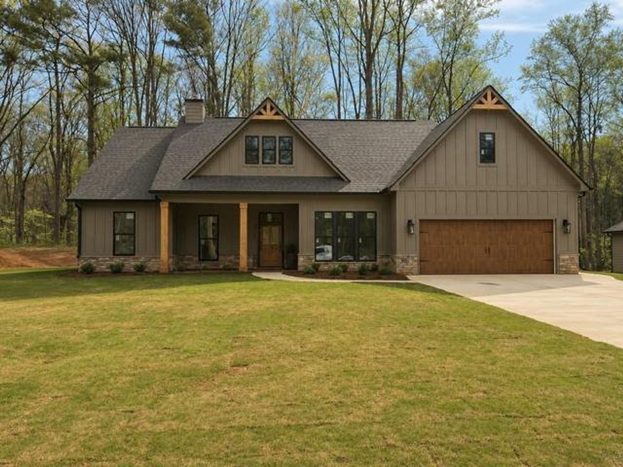 Front exterior of a new home in , Rockmart, GA, highlighting curb appeal (Image 2).