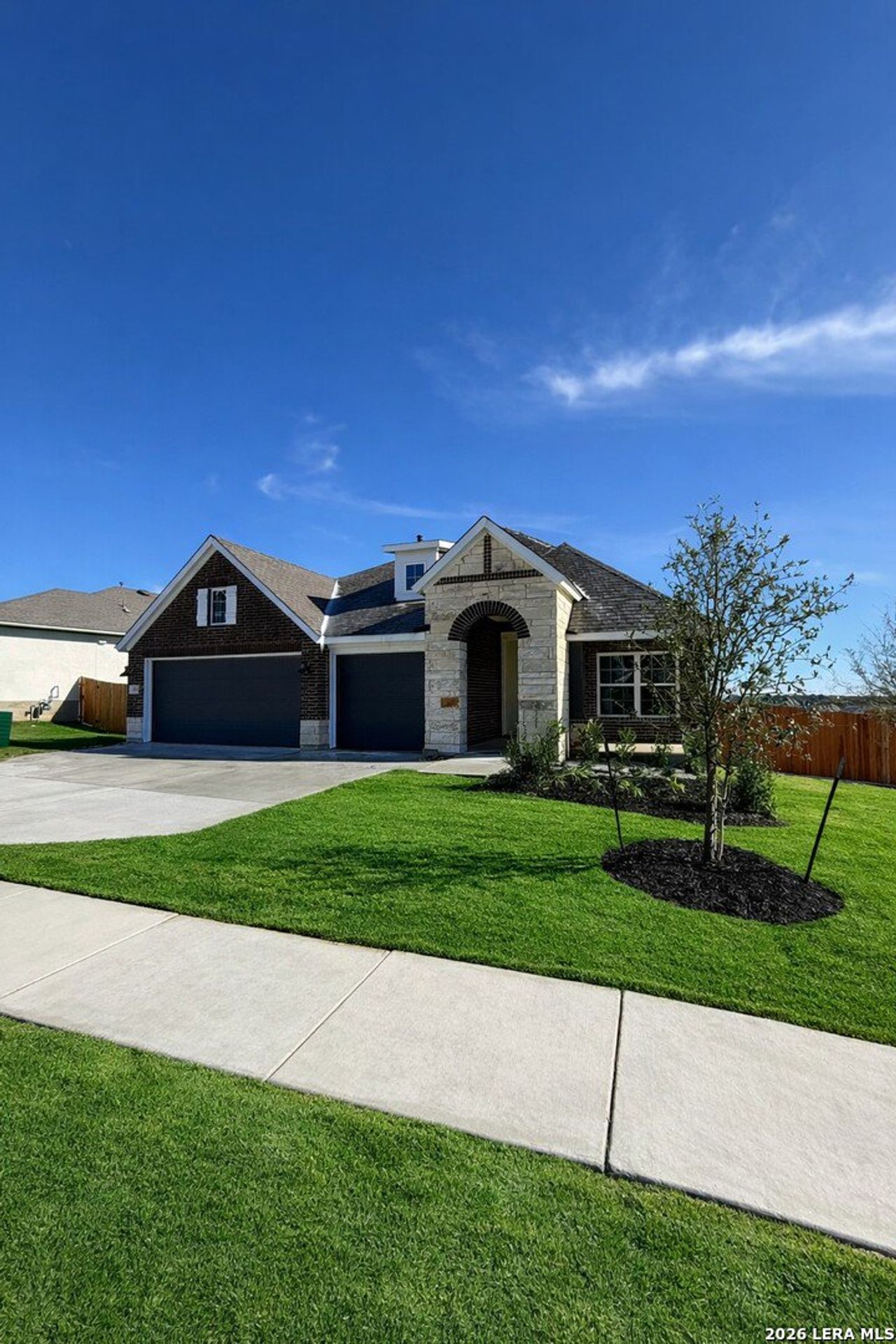 Front exterior of a new home in , New Braunfels, TX, highlighting curb appeal (Image 2).