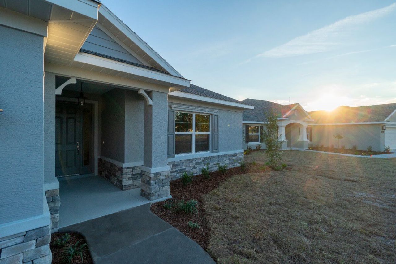 Representative exterior photo of a completed home built from the Brave by Triple Crown Homes in Evergreen Estates, Ocala, FL (Image 2).