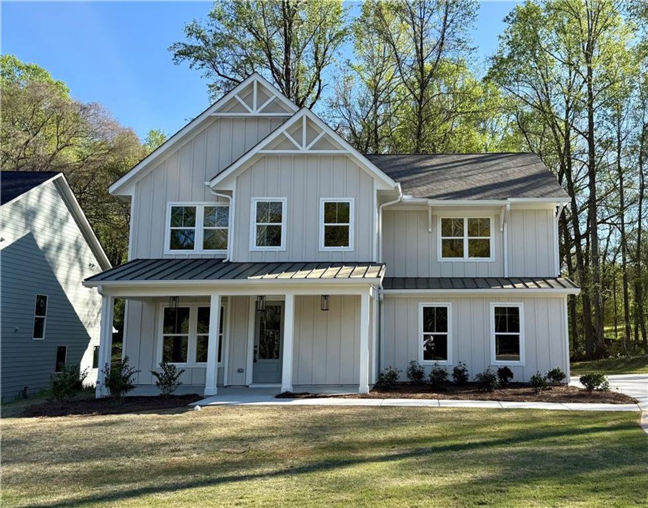 Front exterior of a new home in , Atlanta, GA, highlighting curb appeal (Image 2).
