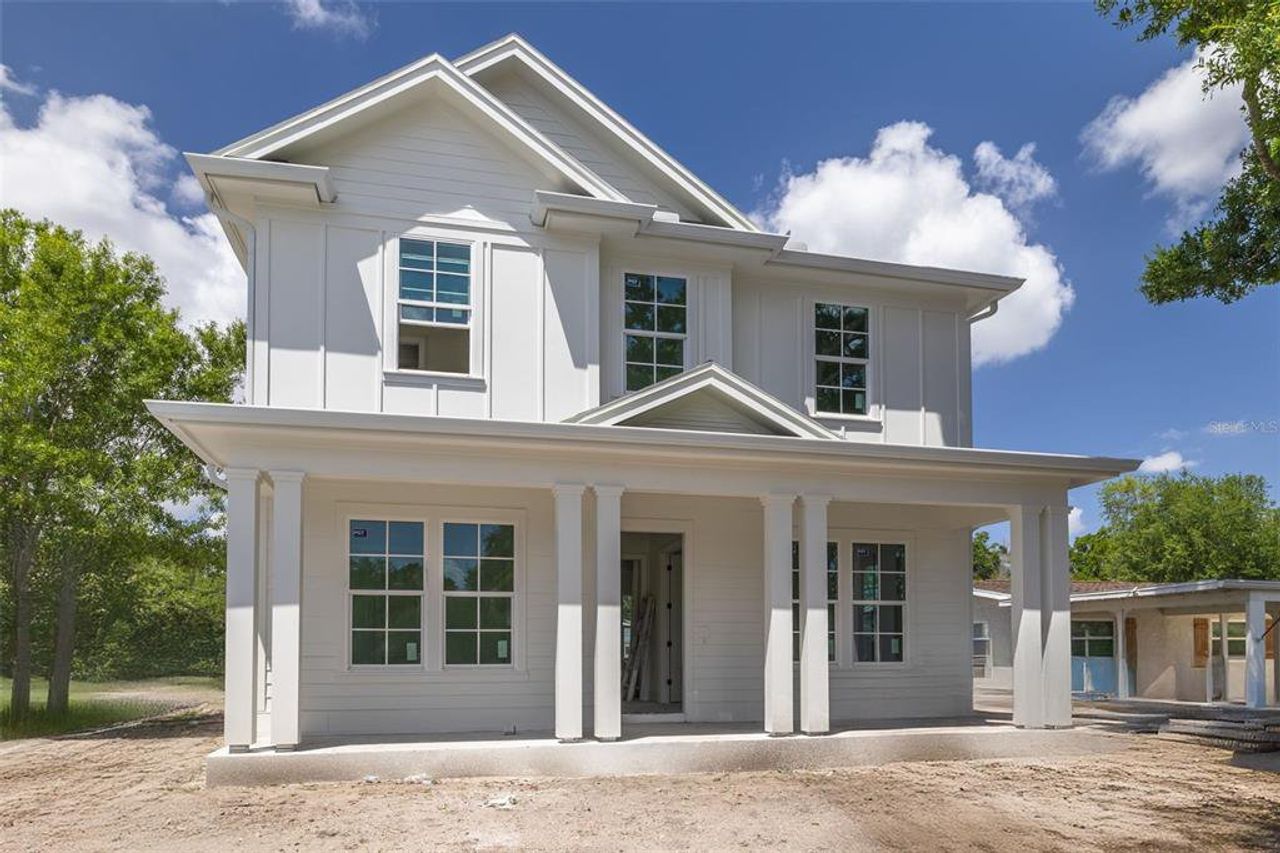 Front exterior of a new home in , St. Petersburg, FL, highlighting curb appeal (Image 2).