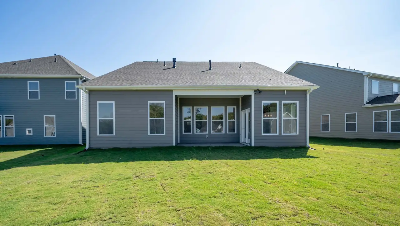 Exterior details and patio area of a home in Adams Glen, Greenville (Image 2).