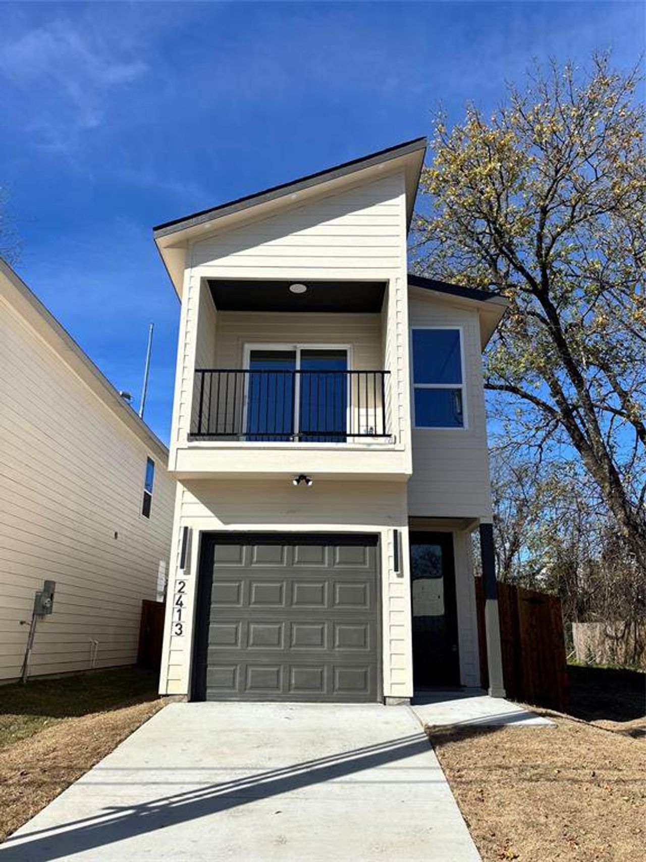 Front exterior of a new home in , Dallas, TX, highlighting curb appeal (Image 2).