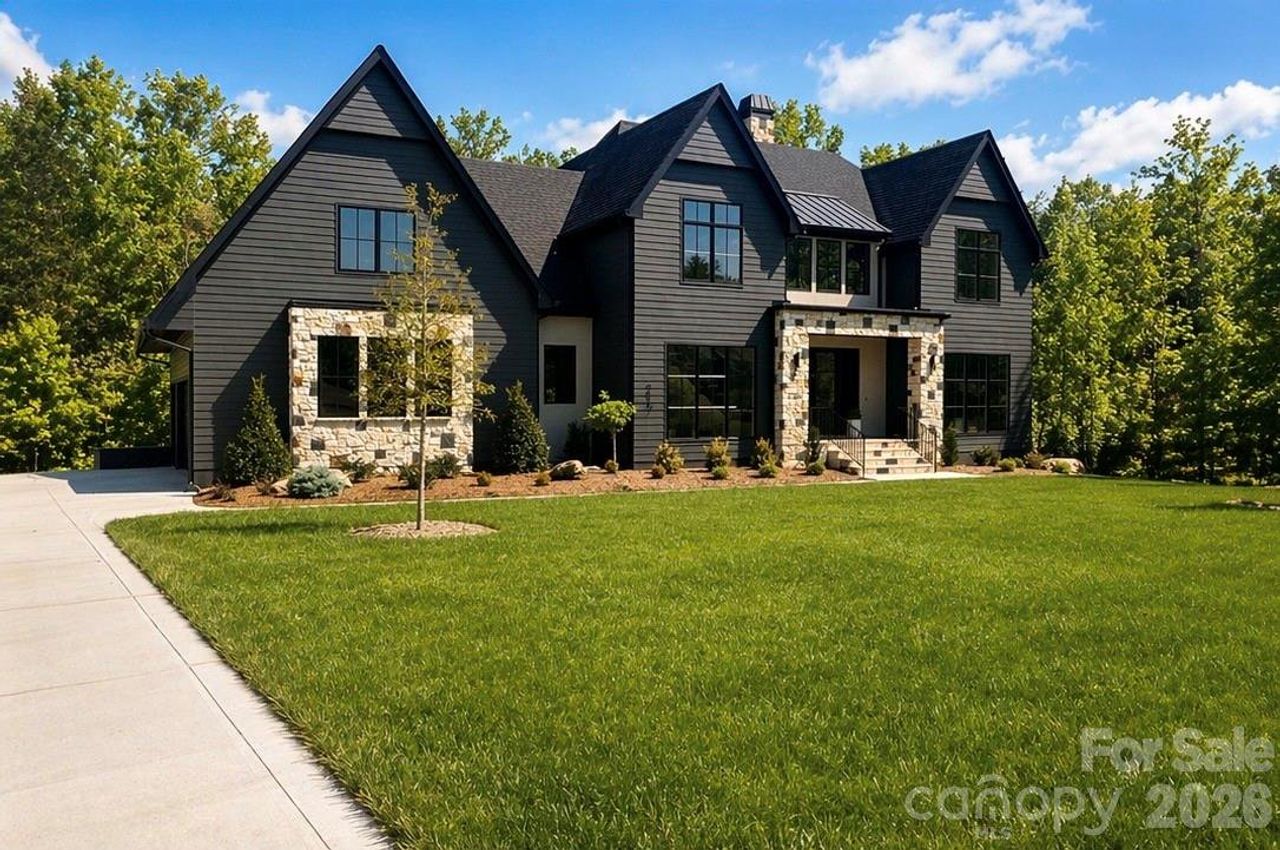Front exterior of a new home in Cardinal Crest, Weddington, NC, highlighting curb appeal (Image 2).