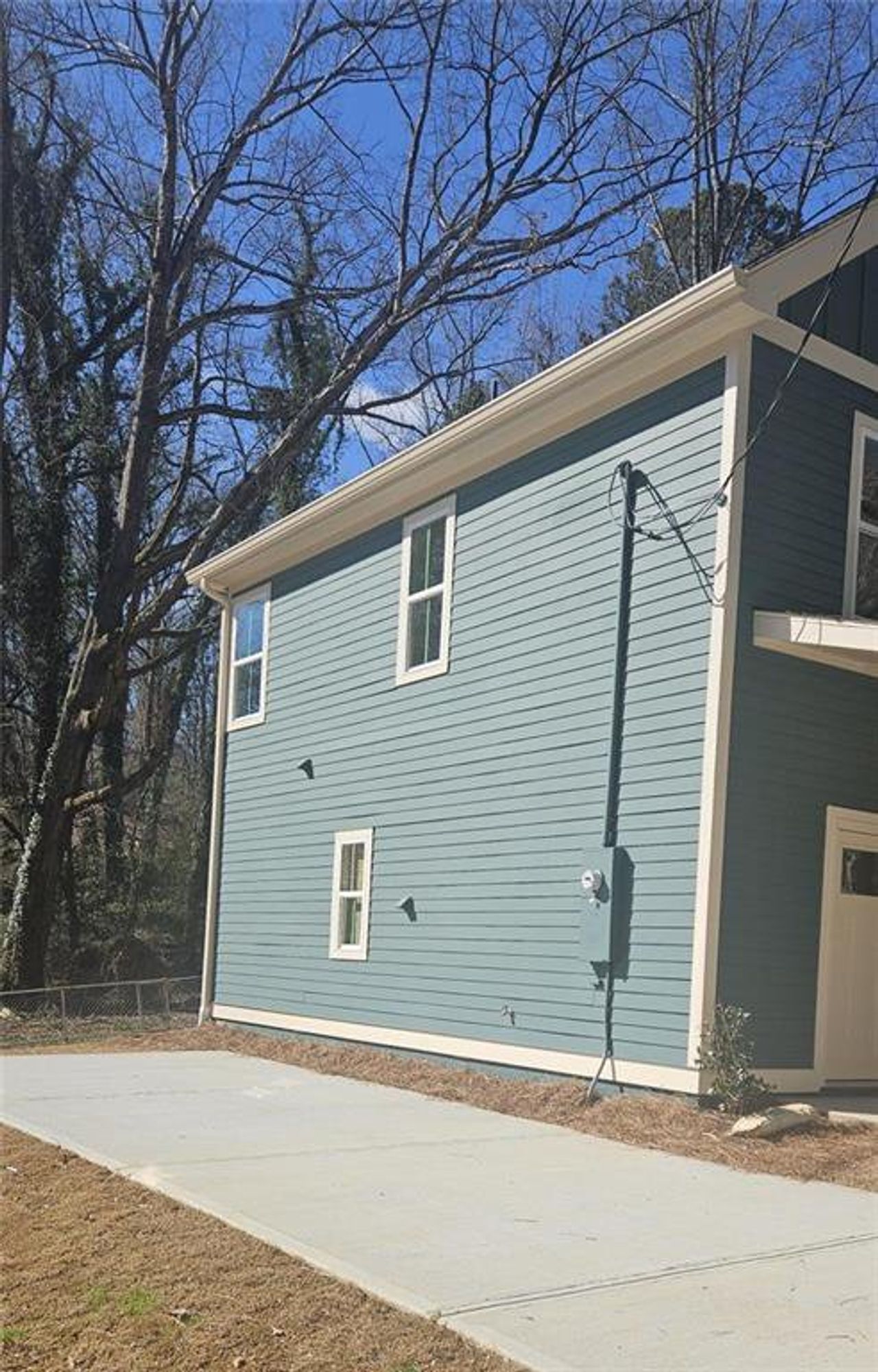 Exterior details and patio area of a home in , Atlanta (Image 2).