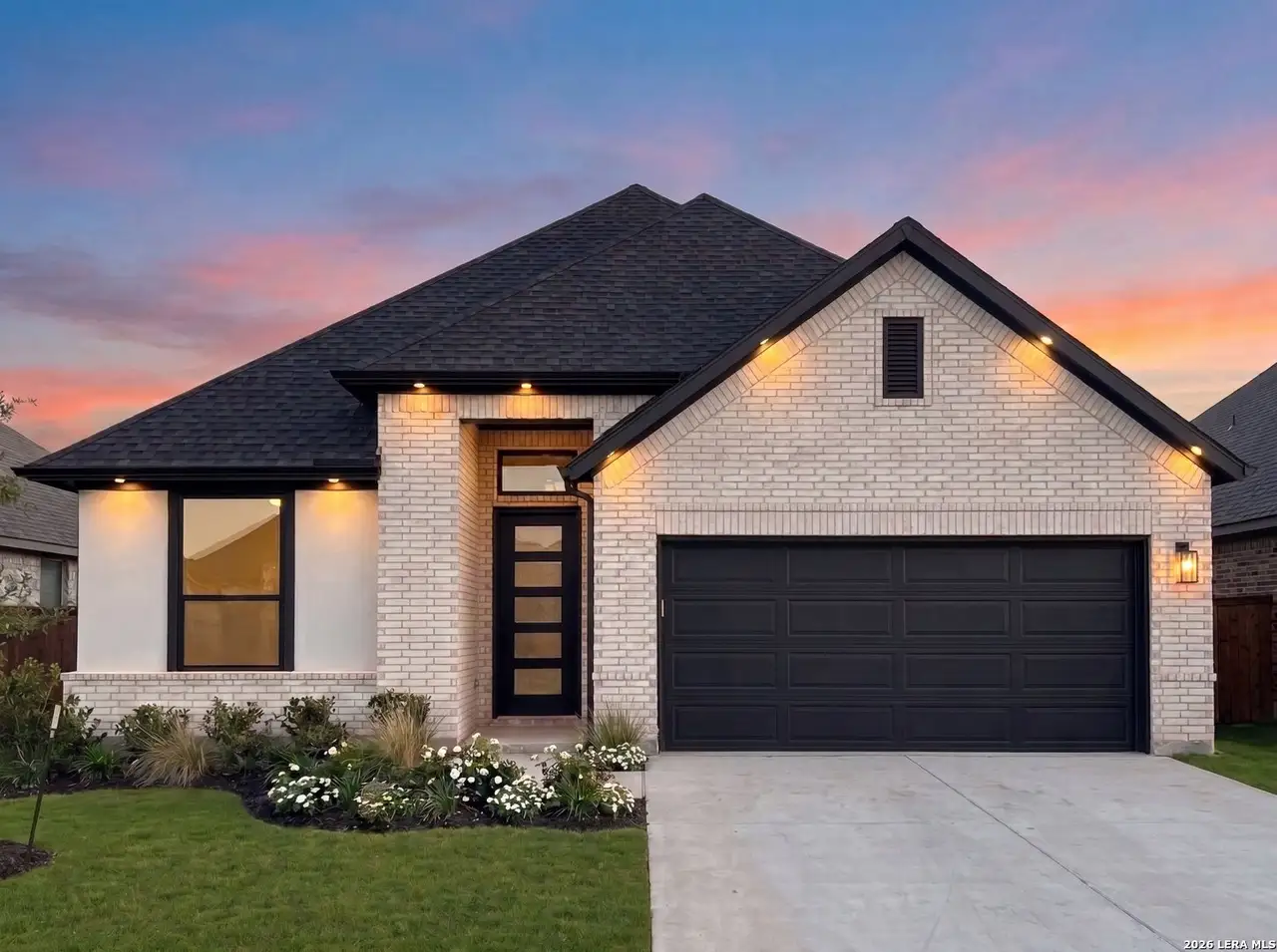 Front exterior of a new home in Dauer Ranch, New Braunfels, TX, highlighting curb appeal (Image 2).