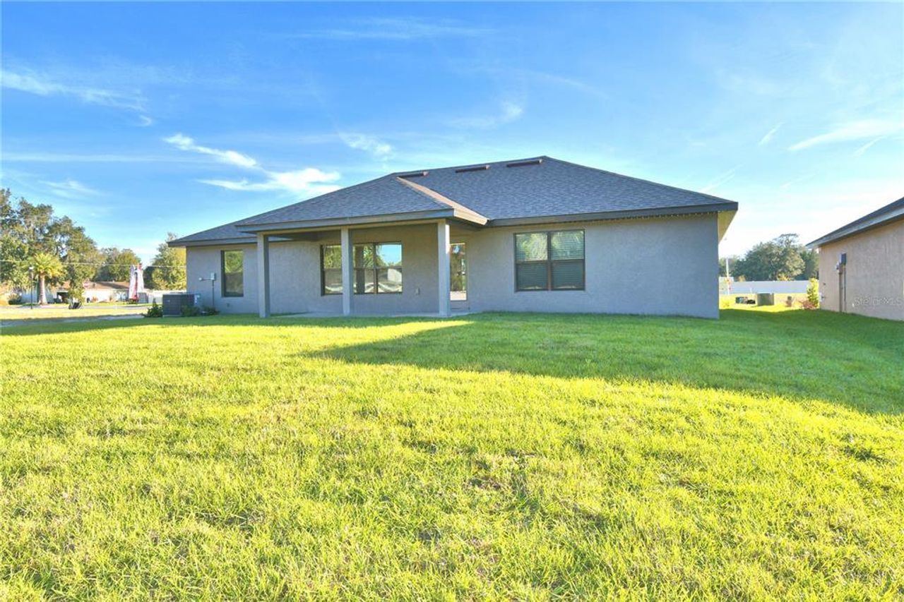 Exterior details and patio area of a home in Hickory Ridge, Lake Wales (Image 2). Exterior details and patio area of a home in Hickory Ridge, Lake Wales (Image 2).