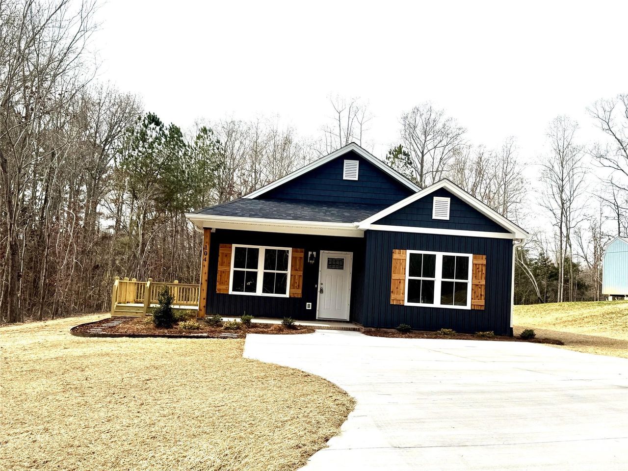 Front exterior of a new home in , Grover, NC, highlighting curb appeal (Image 2). Front exterior of a new home in , Grover, NC, highlighting curb appeal (Image 2).