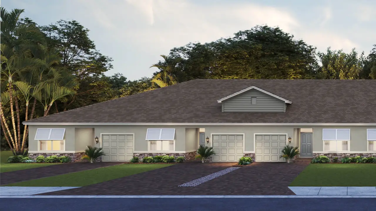 Front exterior of a new home in Orchid Reserve, Sebastian, FL, highlighting curb appeal (Image 2).