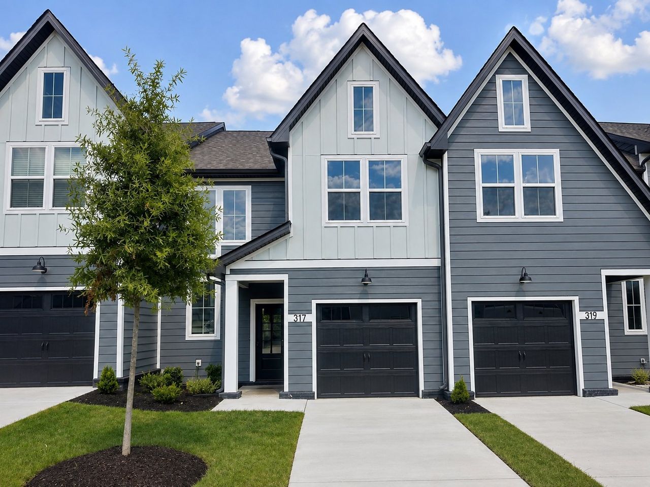 Front exterior of a new home in Tiger Hill Townhomes, Murfreesboro, TN, highlighting curb appeal (Image 2). Front exterior of a new home in Tiger Hill Townhomes, Murfreesboro, TN, highlighting curb appeal (Image 2).
