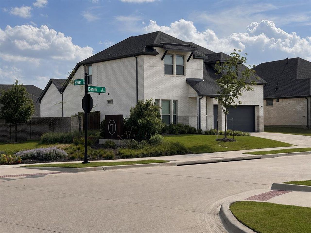 Front exterior of a new home in Tesoro at Chisholm Trail Ranch, Crowley, TX, highlighting curb appeal (Image 2).