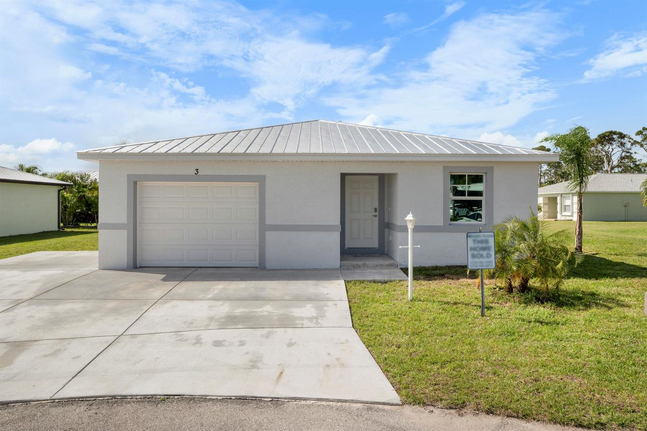 Front exterior of a new home in , Fort Pierce, FL, highlighting curb appeal (Image 2). Front exterior of a new home in , Fort Pierce, FL, highlighting curb appeal (Image 2).