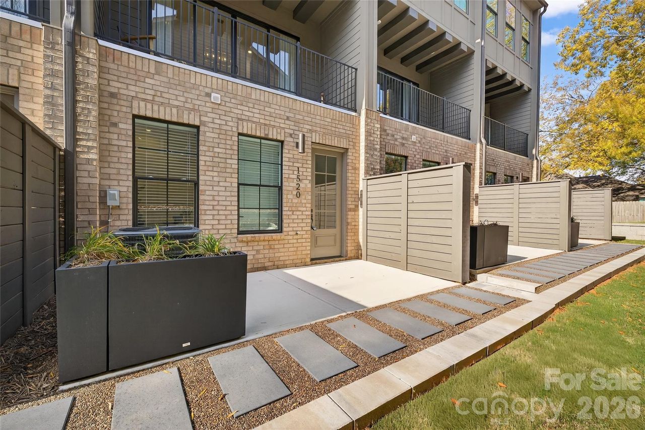 Exterior details and patio area of a home in , Charlotte (Image 2). Exterior details and patio area of a home in , Charlotte (Image 2).