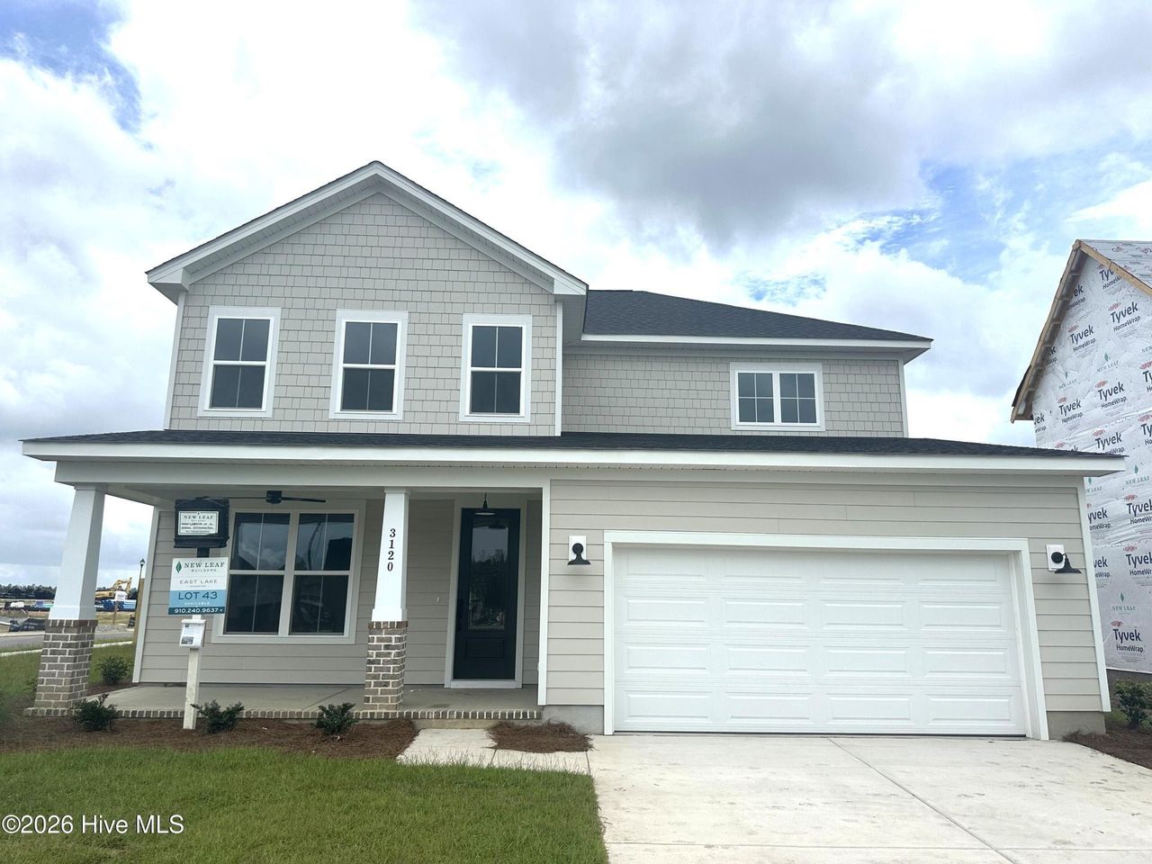 Front exterior of a new home in East Lake, Leland, NC, highlighting curb appeal (Image 2).