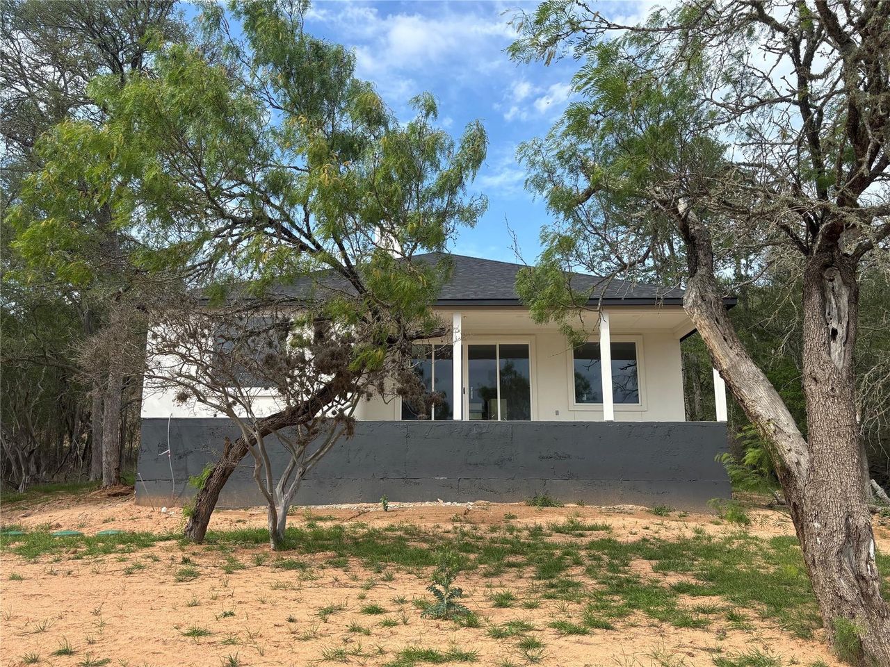 Exterior details and patio area of a home in , Bastrop (Image 2).