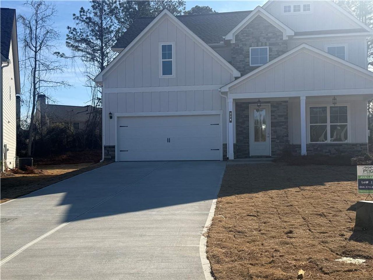 Front exterior of a new home in , Villa Rica, GA, highlighting curb appeal (Image 2).