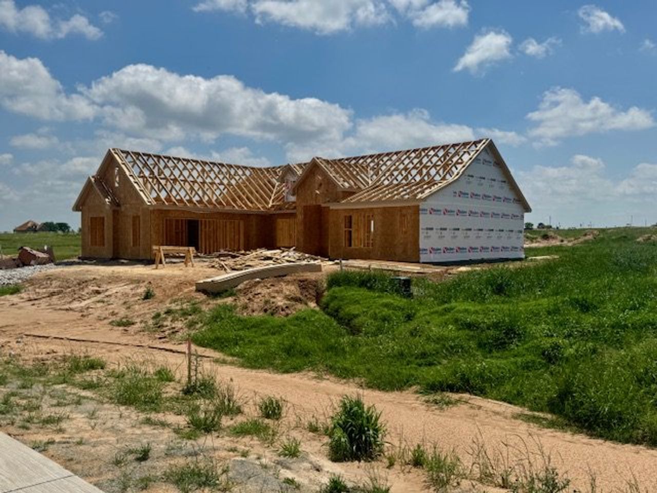 Front exterior of a new home in Stagecoach Crossing, Bridgeport, TX, highlighting curb appeal (Image 2).