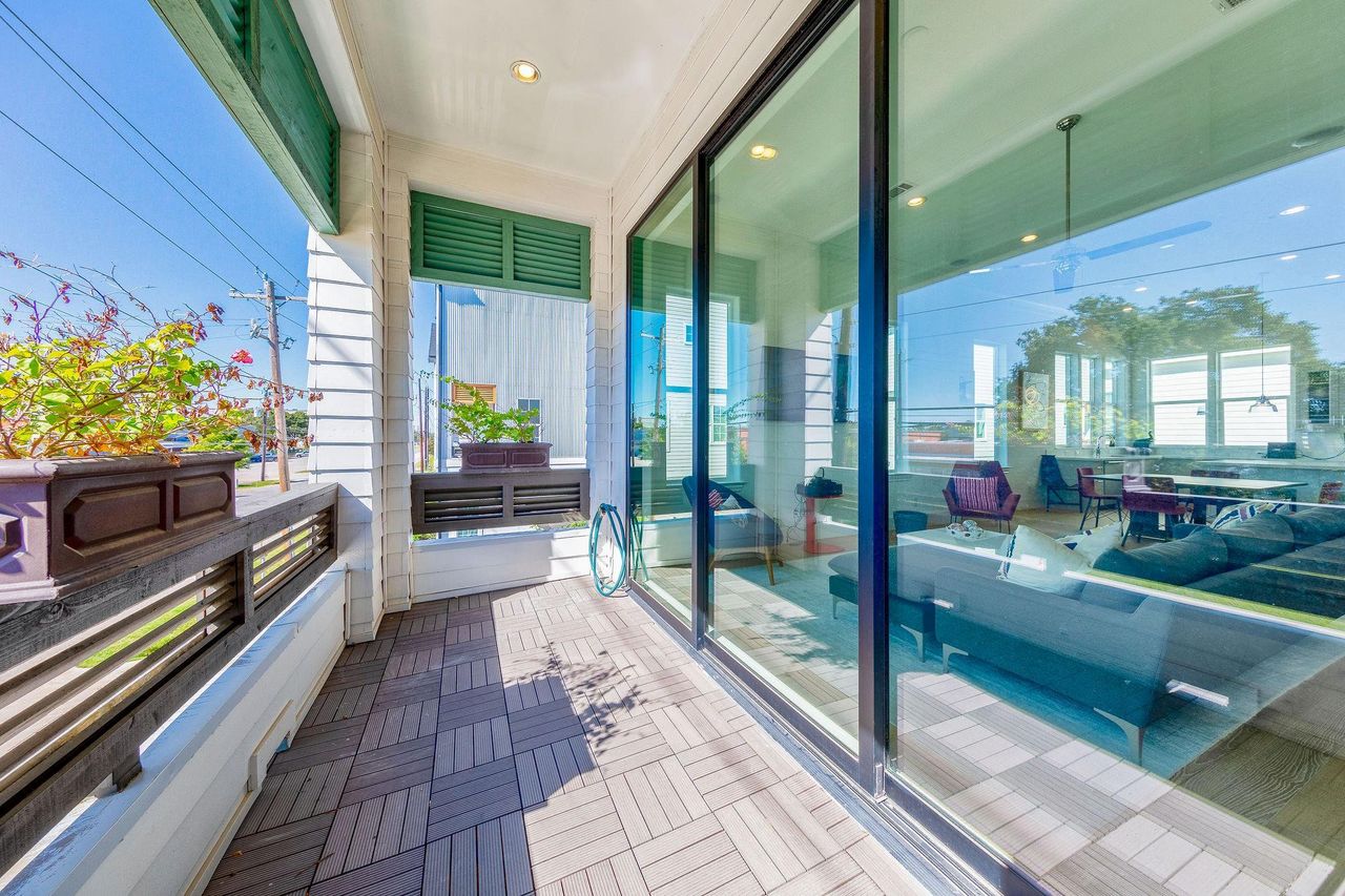 spacious balcony with gas/water line and 10ft glass sliding trifold doors