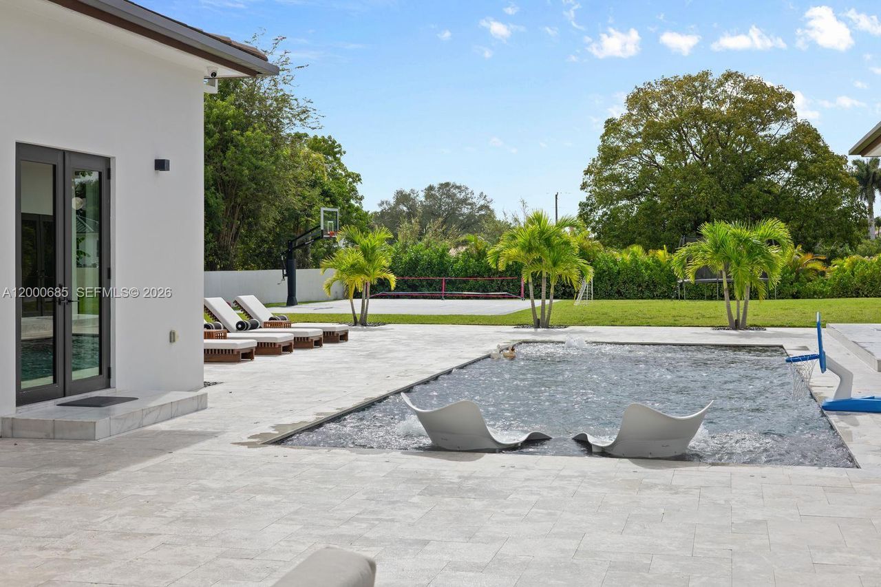 Exterior details and patio area of a home in , Miami (Image 2).
