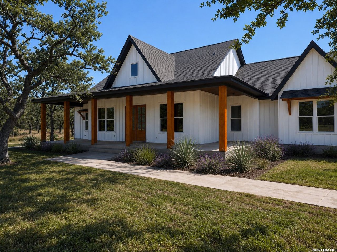 Front exterior of a new home in , La Vernia, TX, highlighting curb appeal (Image 2).