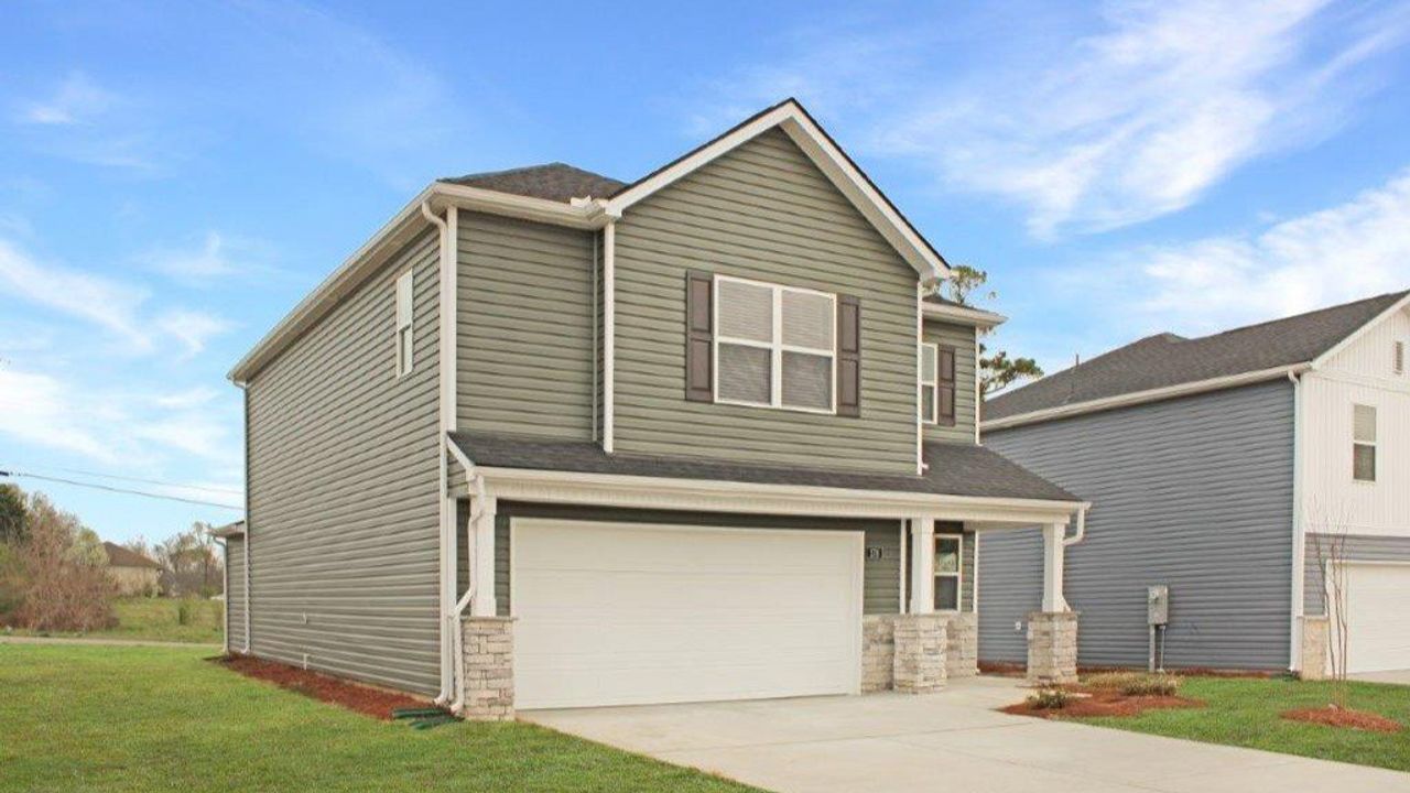 Front exterior of a new home in Evergreen Landing, Rossville, GA, highlighting curb appeal (Image 2).