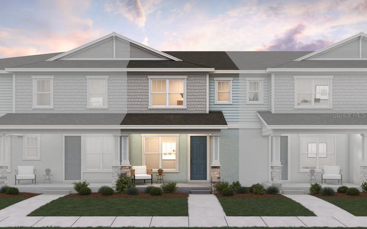 Front exterior of a new home in Hamlin Meadows, Winter Garden, FL, highlighting curb appeal (Image 2).