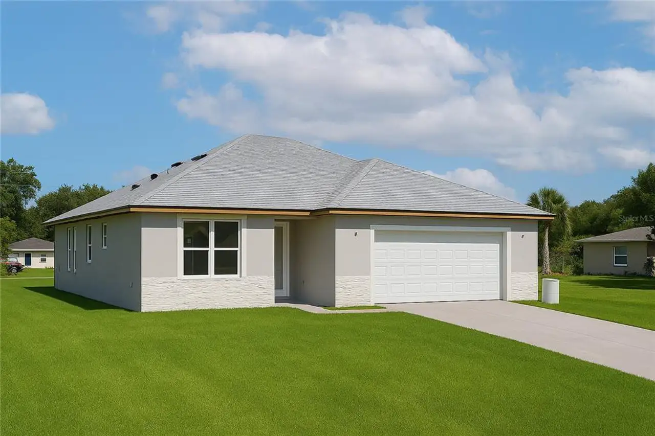 Front exterior of a new home in , Orlando, FL, highlighting curb appeal (Image 2).