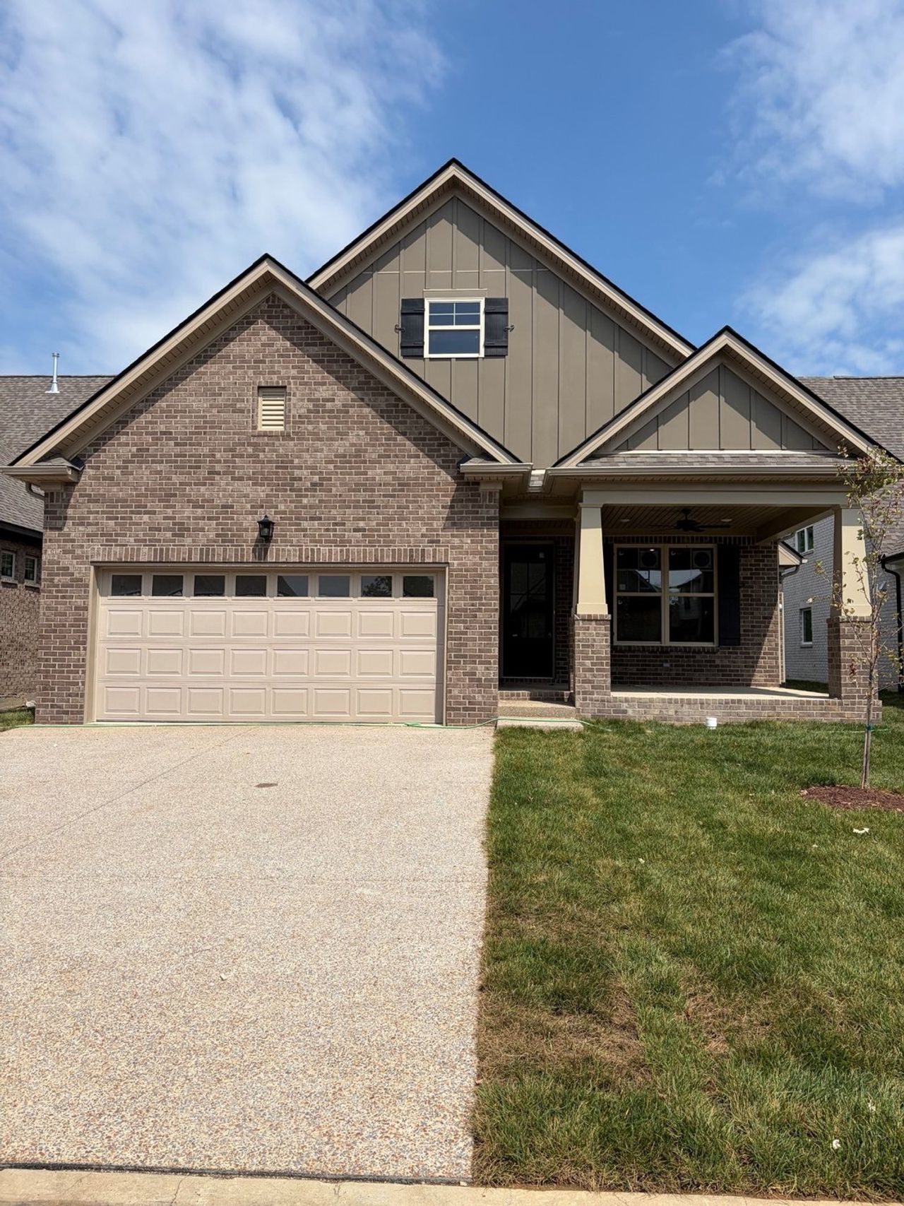 Front exterior of a new home in Bluebird Hollow at Autumn Ridge, Spring Hill, TN, highlighting curb appeal (Image 2).